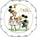 Mickey Mouse is one of the best-known characters in the world. This 1930s dish, listed by Hakes as an olive plate, shows early pictures of Mickey and Minnie dancing and playing the piano. It sold for $345. (Cowles Syndicate Inc.)