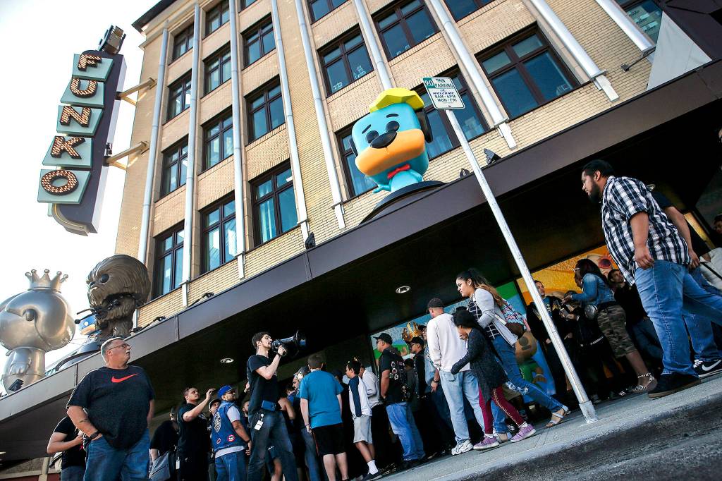 More than 2,000 people show up for a party with the opening of Funkos flagship store in downtown Everett. The toys and collectibles company moved its headquarters to the downtown core in 2017. (Ian Terry / The Herald)