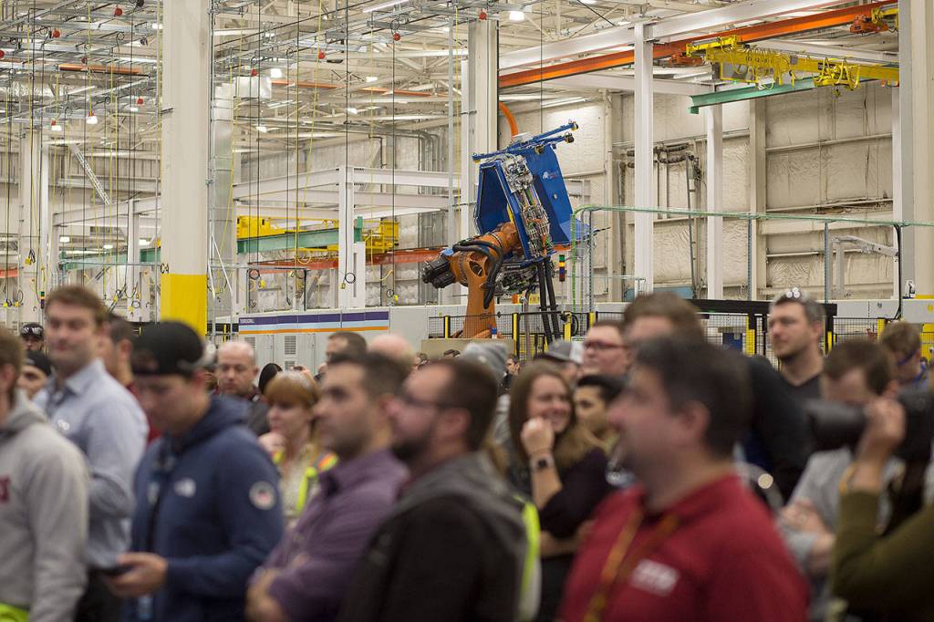 Boeing employees attend a gala at the composite wing center in October. The 777X started production in 2017, meaning that Boeing will retain a presence in Snohomish County for decades. (Dave Rzegocki / The Herald)                                Boeing employees attend a gala at the composite wing center in October. The 777X started production in 2017, meaning that Boeing will retain a presence in Snohomish County for decades. (Dave Rzegocki/For the Daily Herald)