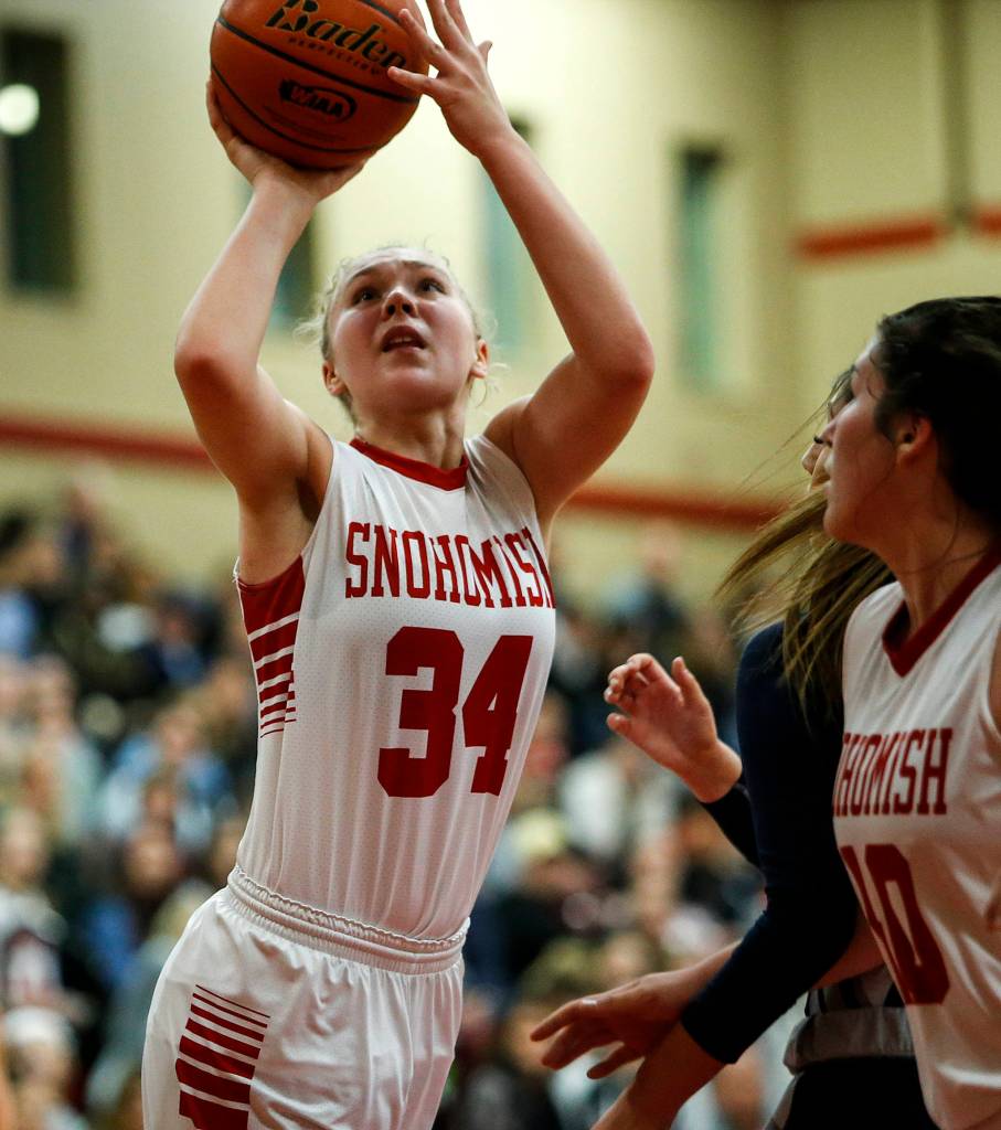 Snohomishs Kyra Beckman (34) takes a shot during a game against Glacier Peak at Snohomish High School on Dec. 19. (Ian Terry / The Herald)