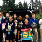 Students at St. Thomas More Parish School in Lynnwood collected toys to help children at Christmas through Catholic Community Services. (Contributed photo)