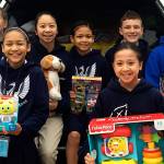School kids fill “sleigh” for peers