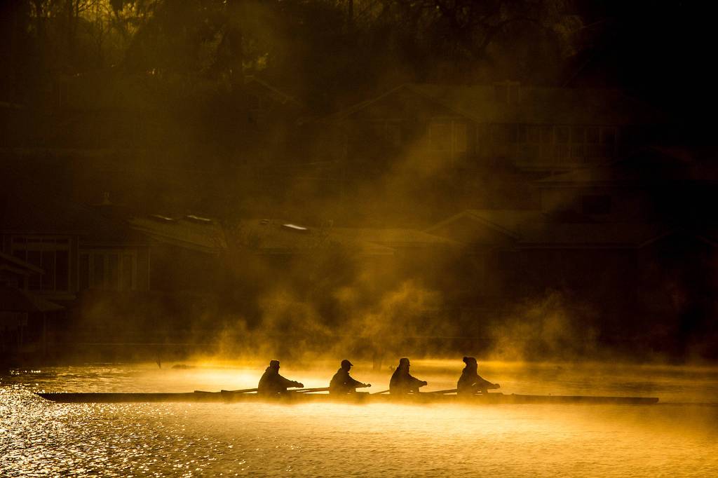 Members of the Lake Stevens Rowing Club glide across the water during a practice Jan. 14. (Ian Terry / The Herald)