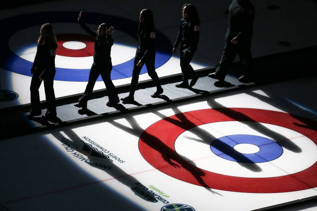 Curling athletes are introduced during the opening ceremony of the 2017 USA Curling Nationals at Xfinity Arena in Everett on Feb. 11. (Kevin Clark / The Herald)