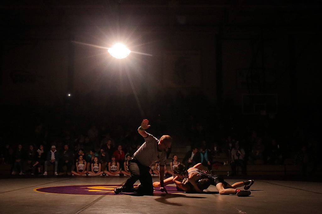 Wrestling at Lake Stevens High School in Lake Stevens on Dec. 21. (Kevin Clark / The Herald)