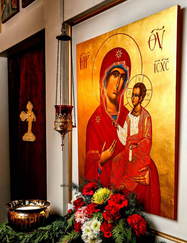 Despite a humble exterior location for a church, beautiful icons inside are a distinct feature of Orthodox churches, and are believed to be windows to heaven. This icon of Mary and the Christ child was painted using gold leaf and egg tempera by iconographer Heather Sommer, the wife of the Rev. David Sommer. (Dan Bates / The Herald)