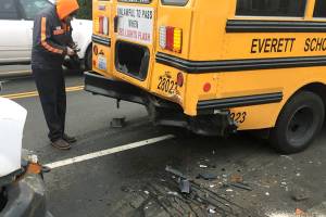 Truck rear-ends school bus in Everett; 2 sent to hospital