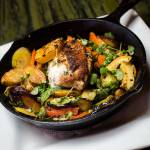 Lombardis 40 Clove Chicken is loaded with garlic. (Andy Bronson / The Herald)