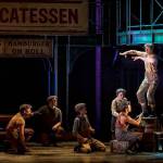 Everett native Lukas Poischbeg, standing on the barrel, plays Buttons, one of about a dozen of newsboys in Village Theatres Newsies. (Mark Kitaoka)