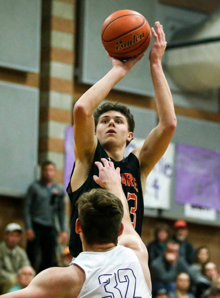 Monroes Colby Kyle takes a shot during a game against Kamiak on Jan. 2, 2018, at Kamiak High School in Mukilteo. (Ian Terry / The Herald)