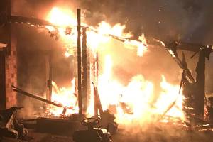 No injuries after fire damages carport at Bothell home