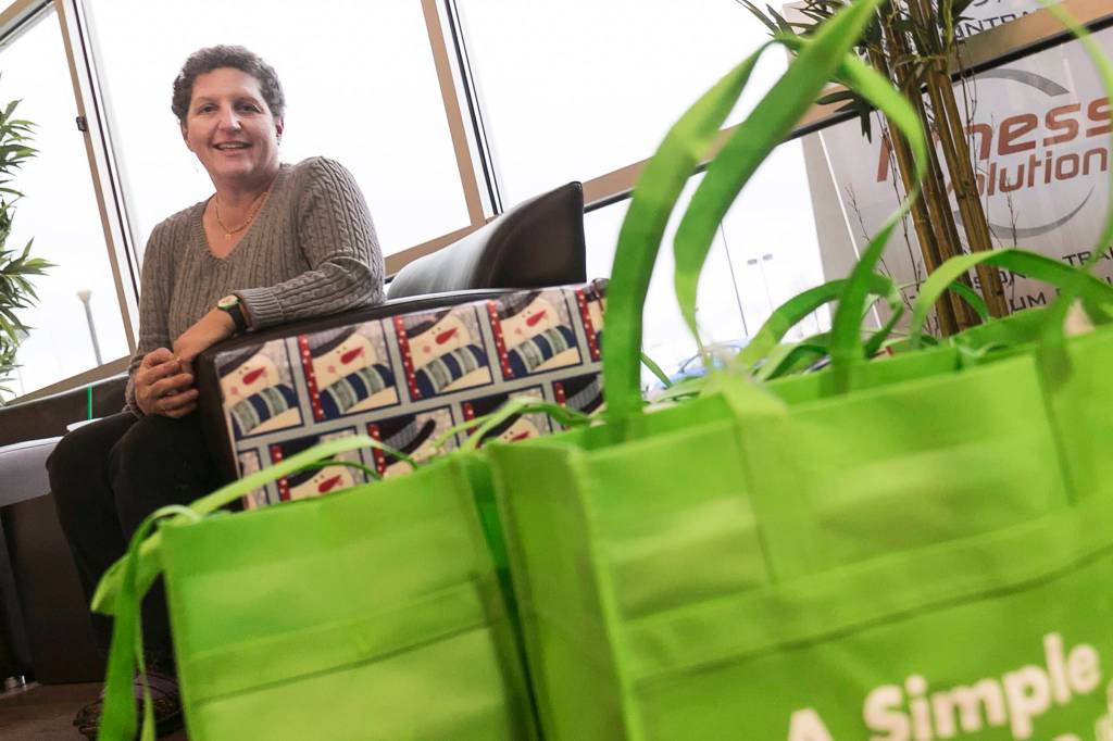 Faith Martian organized a local A Simple Gesture at Fitness Evolution, the communal pick-up point, in Arlington on Jan. 12. (Kevin Clark / The Herald)