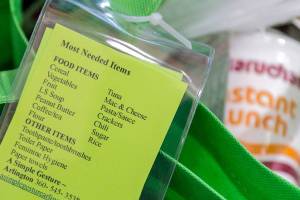 Food stuffs for a local chapter of A Simple Gesture at Fitness Evolution, the communal pick-up point, in Arlington on Jan. 12. (Kevin Clark / The Herald)