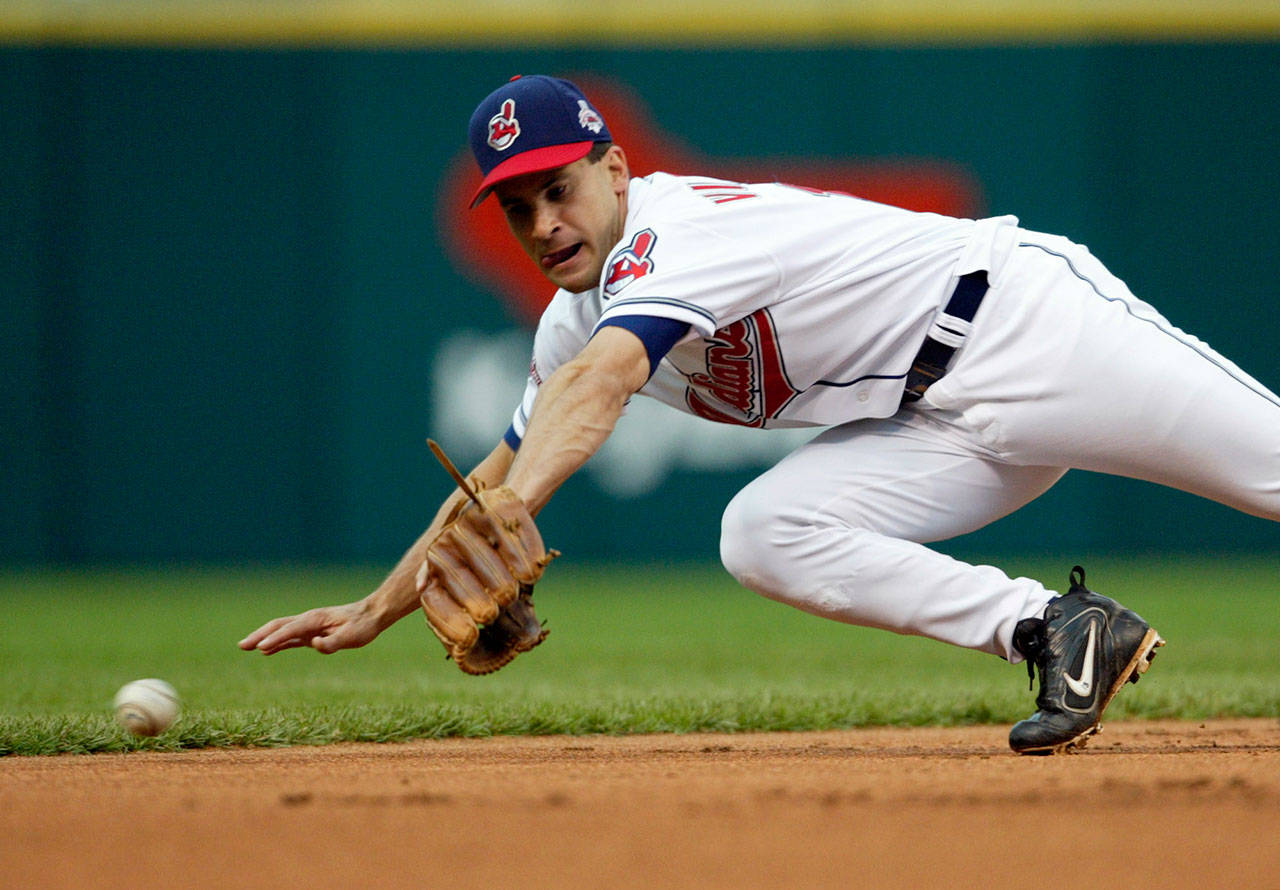 Former Indians and Mariners shortstop Omar Vizquel recorded 2,877 hits and received 11 Gold Gloves over his 24-year career. Is that enough for enshirement in the National Baseball Hall of Fame? (AP Photo/Ron Schwane)