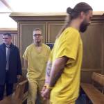 Hubert Wiecek (left) and Waclaw Kieltyka, two of the four members of the Polish heavy metal band Decapitated, leave court in Spokane in October. Rape and kidnapping charges against all four members of the band were dropped Friday by prosecutors in Washington state. They have been detained in the United States since a woman claimed that she was gang-raped after a concert last year in Spokane, Washington. (Nicholas K. Geranios / Associated Press)