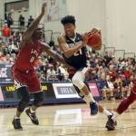 Gonzaga forward Rui Hachimura (21) drives as Loyola Marymount forward Eli Scott (0) defends during the first half of a game Jan. 6, 2018, in Los Angeles. Gonzaga won 85-66. (AP Photo/Reed Saxon)