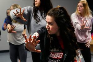 Madison Young, 16, (foreground) works with other students, following the lead of instructor Andrew Faulkner in a hip hop dance class at Northwest Dance & Acro at Smokey Point in Arlington Thursday night. (Dan Bates / The Herald)