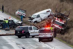 Log truck and 5 other vehicles crash, blocking US 2