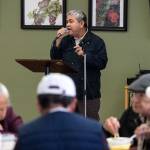 Hau Tran sings as Vietnamese seniors eat at Homages Center for Healthy Living on Wednesday, Jan. 10, 2018 in Lynnwood, Wa. Each weekday the center offers its room for various cultures to get together for activities and lunch while speaking their native languages. (Andy Bronson / The Herald)