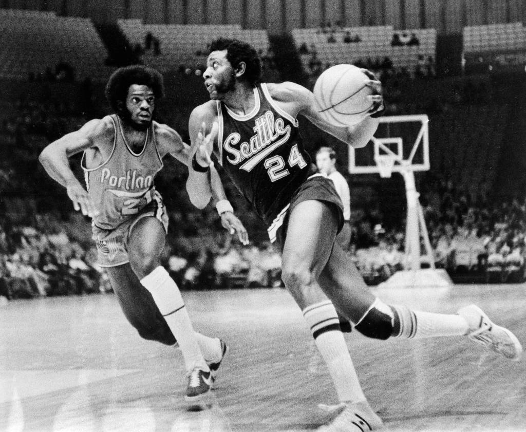 Harold Filan / Associated Press                                The SuperSonics Spencer Haywood (24) drives around the Trail Blazers Sidney Wicks during an 1972 exhibition game in Los Angeles.