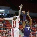 Washingtons Jaylen Nowell (5) shoots over Washington States Vionte Daniels (4) during a win over the Cougars on Jan. 6 in Pullman. The Huskies 3-point shooting is still a question mark despite their 3-1 start to Pac-12 play. (AP Photo/Young Kwak)