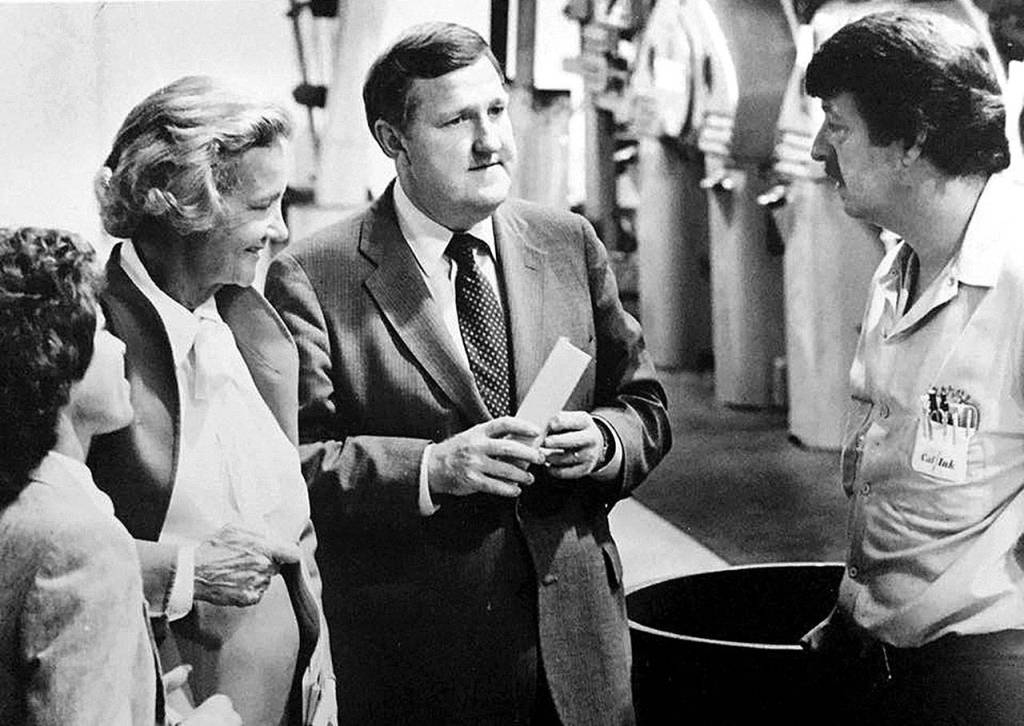 Katharine Graham (second from left), then CEO and chairwoman of the board of The Washington Post Co., meets with Joann Byrd (far left), then executive editor of The Daily Herald, then-Herald Publisher Larry Hanson (second from right), and then-press foreman Larry Earlywine during her visit to Everett on Sept. 20, 1984. The Washington Post. Co. owned The Herald from 1978 until 2013. (Herald archives)