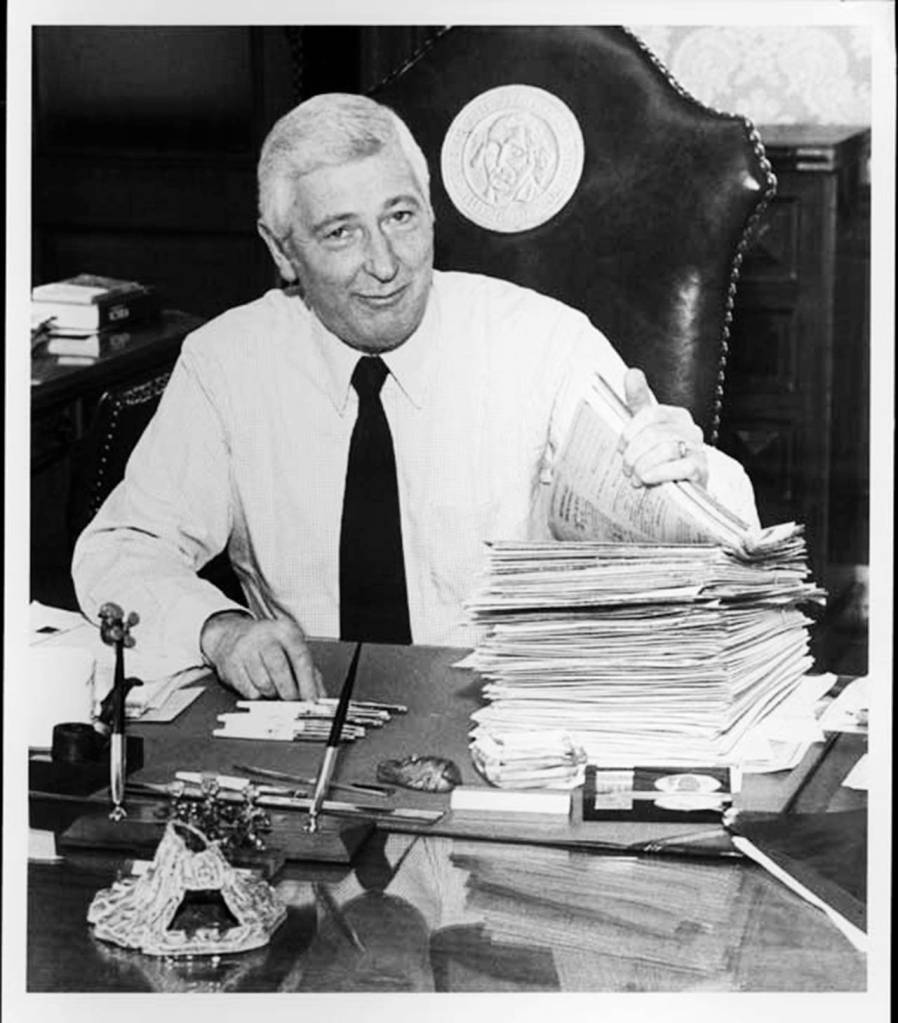 Gov. Spellman puts his signature on legislation in his office in 1981. (Washington State Archives)