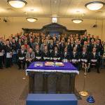 Members of the newly formed Mill Creek Lodge No. 243 celebrate the Dec. 30 merger of two south Snohomish County Masonic Lodges, Robert Burns No. 243 and Genesis No. 305. (Photo by MarTeam Photography)
