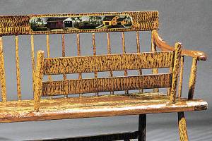 Long rocking bench with strange fence is for protecting baby