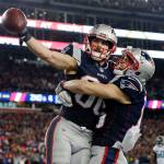 New England Patriots wide receiver Danny Amendola, left, celebrates his touchdown catch with Chris Hogan, right, during the second half of the AFC championship NFL football game against the Jacksonville Jaguars, Sunday, Jan. 21, 2018, in Foxborough, Mass. (AP Photo/David J. Phillip)