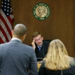 Judge Chris Lanese talks with attorneys during a hearing in Thurston County Superior Court in Olympia, in October. Lanese, last week, ruled in favor of a media coalition that sought to apply the state Public Records Act to state legislators. (Ted S. Warren/Associated Press file photo)