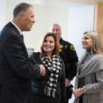 Gov. Jay Inslee meets Shandell Orr (center) and Julia McCracken, who are recovering from opioid addiction, during a tour of Snohomish countys planned diversion center in downtown Everett on Jan. 18. The center, beginning in March, will provide temporary housing and treatment for those stuggling with homeless, addiction and mental illness isues. (Ian Terry/The Herald)