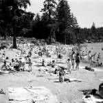 Sunbathers at Lake Goodwin State Park (Wenberg Park) near Stanwood in June 1958. Librarian Rob Branigin hopes to record oral histories, including stories about what it was like growing up around Stanwood in the mid-20th century. (Herald file)