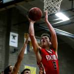 Stanwoods Matt Vail (3) goes up for a shot during a game against Arlington on Jan. 26, 2018, at Arlington High School. (Ian Terry / The Herald)