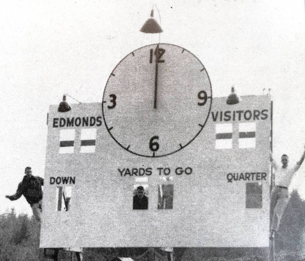 From left: Dale Burdett, Ron Wailes and Loel Symmes at the installation of a new scoreboard at Civic Stadium in 1952. (Edmonds Historical Museum)