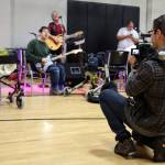 Cameron Sullivan makes a video of members of Voices in the Village during the monthly dance party at the YMCA in Marysville. (Kevin Clark / The Daily Herald)