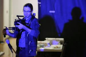Cameron Sullivan videos members of Voices in the Village during the monthly dance party at the YMCA in Marysville as part of a documentary on January 25, 2018. (Kevin Clark / The Daily Herald)