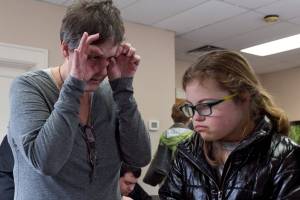 Kevin Clark / The Herald                                Susan Ingram explains the process of setting gems during the Eagle Festival on Saturday morning in Arlington.