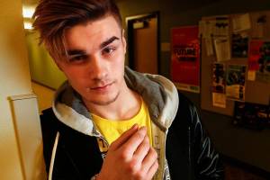 Super Kid Erik Linder is a world champion ballroom dancer who regularly flies all over U.S. and world for competition, so he benefits from the alternative schedule that AIM High School provides. (Dan Bates / The Herald)