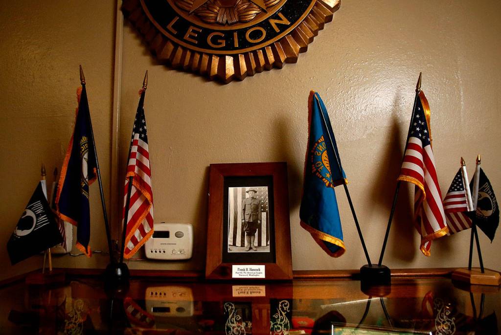Among the many displays in the Stanwood American Legion Post 92 is a photograph of World War I soldier Frank H. Hancock, the original namesake of Post 92. He was killed in France on Sept. 26, 1918. (Dan Bates / The Herald)