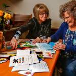 On her 90th birthday Monday, Doris Goertz of Lake Stevens and her daughter, Rachel OBrien, read some pretty hilarious notes as they go through some of the 186 or so letters and cards Goertz recieved after OBrien recruited friends to send them snail mail instead of email. (Dan Bates / The Herald)