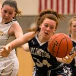 Arlingtons Kelsey Mellick reaches for a loose ball Fridayt at Shorecrest High School. (Kevin Clark / The Daily Herald)