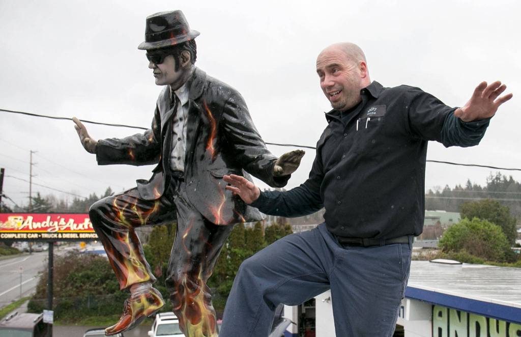 Corey Jonson, owner of Andys Auto Repair, purchased statues of the Blues Brothers, which now have become at staple of the Lynnwood establishment. (Kevin Clark / The Herald)