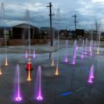 The Pacific Rim Plaza splash at Fishermans Harbor is part of the new development being built on Everetts waterfront. (Kevin Clark / The Herald)