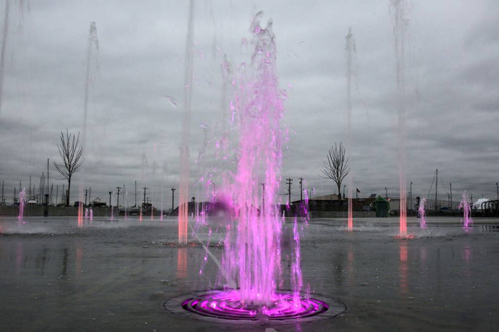 The Pacific Rim Plaza splash at Fishermans Harbor is part of the new development being built on Everetts waterfront. (Kevin Clark / The Herald)