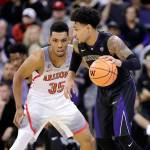 Washingtons David Crisp drives against Arizonas Allonzo Trier during the Huskies 78-75 upset of the Wildcats on Feb. 3 in Seattle. (AP Photo/John Froschauer)