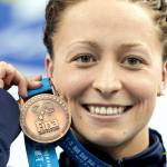 Ariana Kukors, of the United States, holds her bronze medal for the womens 200-meter Individual Medley final at the FINA 2011 Swimming World Championships in Shanghai, China. The U.S. (AP Photo/Michael Sohn, File)