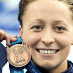 Champion swimmer accuses Olympic coach of underage sex abuse