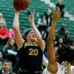 Mariners Taliyah Clark (20) takes a shot during a playoff game against Jackson on Feb. 8, 2018, at Jackson High School in Mill Creek. (Ian Terry / The Herald)