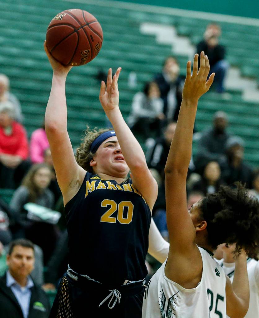 Mariners Taliyah Clark (20) takes a shot during a playoff game against Jackson on Feb. 8, 2018, at Jackson High School in Mill Creek. (Ian Terry / The Herald)